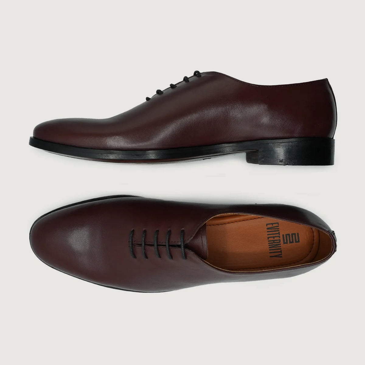Director Wholecut Maroon Leather Shoes For Men - Lateral Side Profile View Showing Sleeve Cut & Athletic Taper Fit