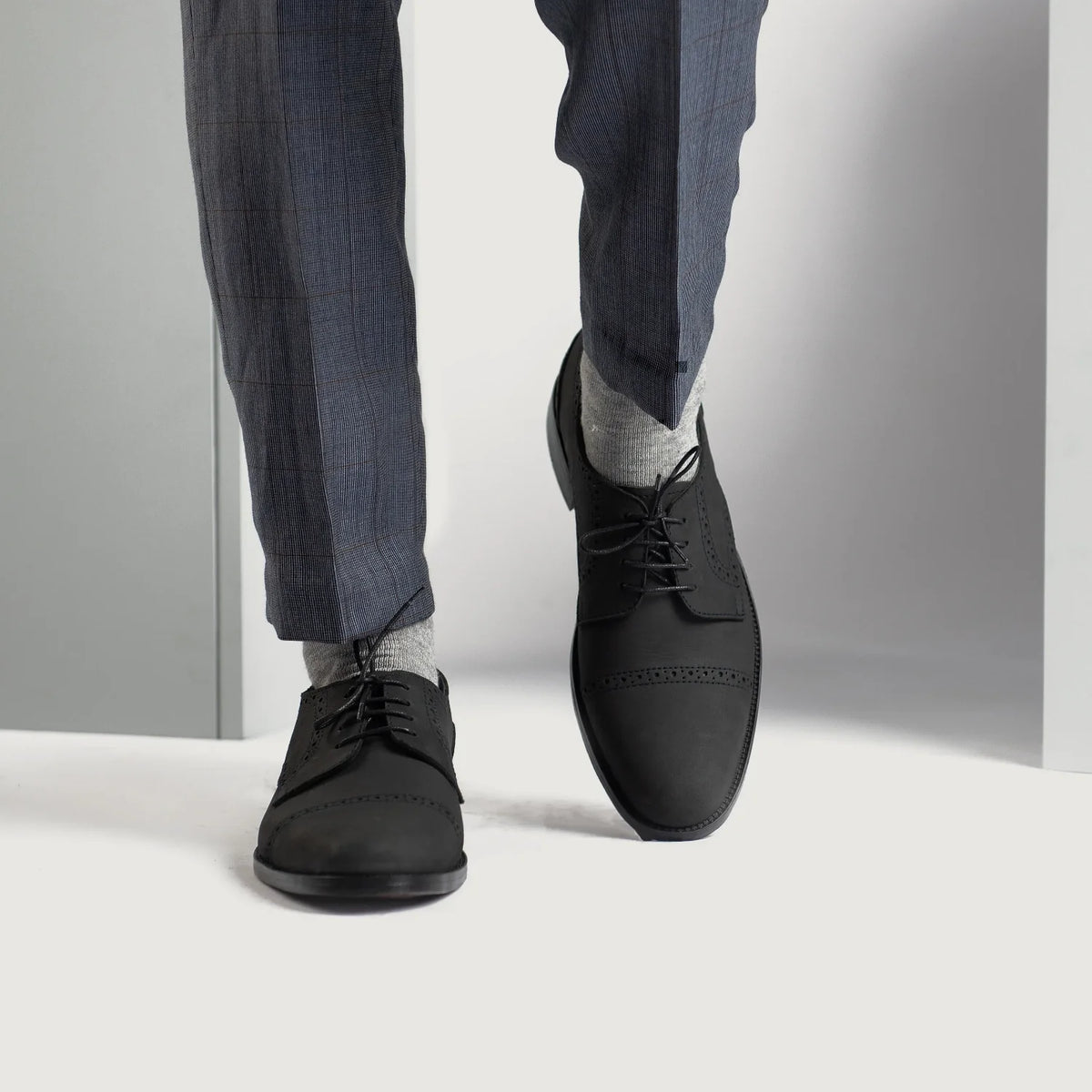 Styled On-Foot Perspective Demonstrating Ankle Fit & Silhouette on Model
