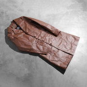 
Open Hem & Hem Craftsmanship Construction Detail on Women's Alice Brown Double Breasted Leather Coat