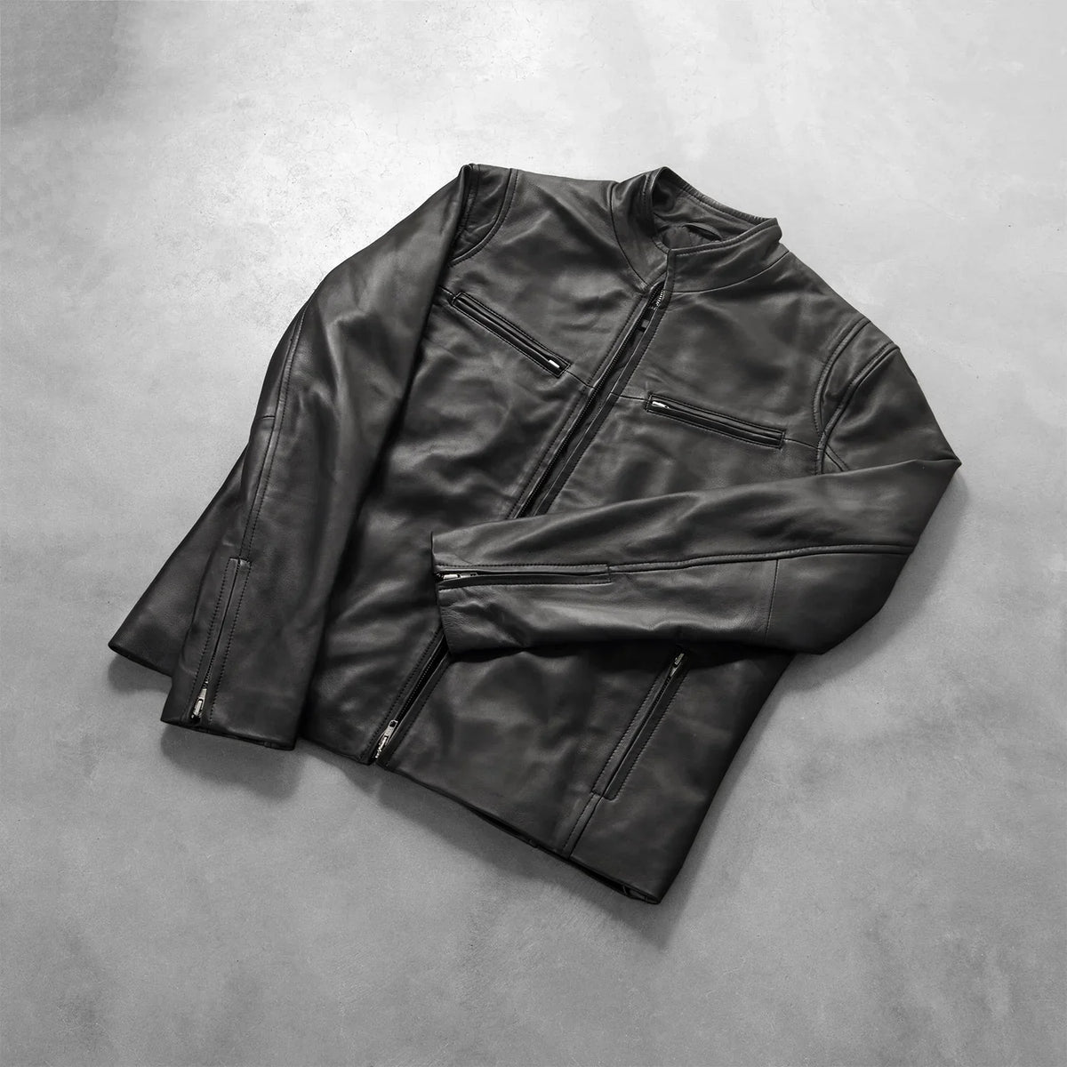 
Zipper & Hem Craftsmanship Construction Detail on Men's Ionic Black Leather Jacket