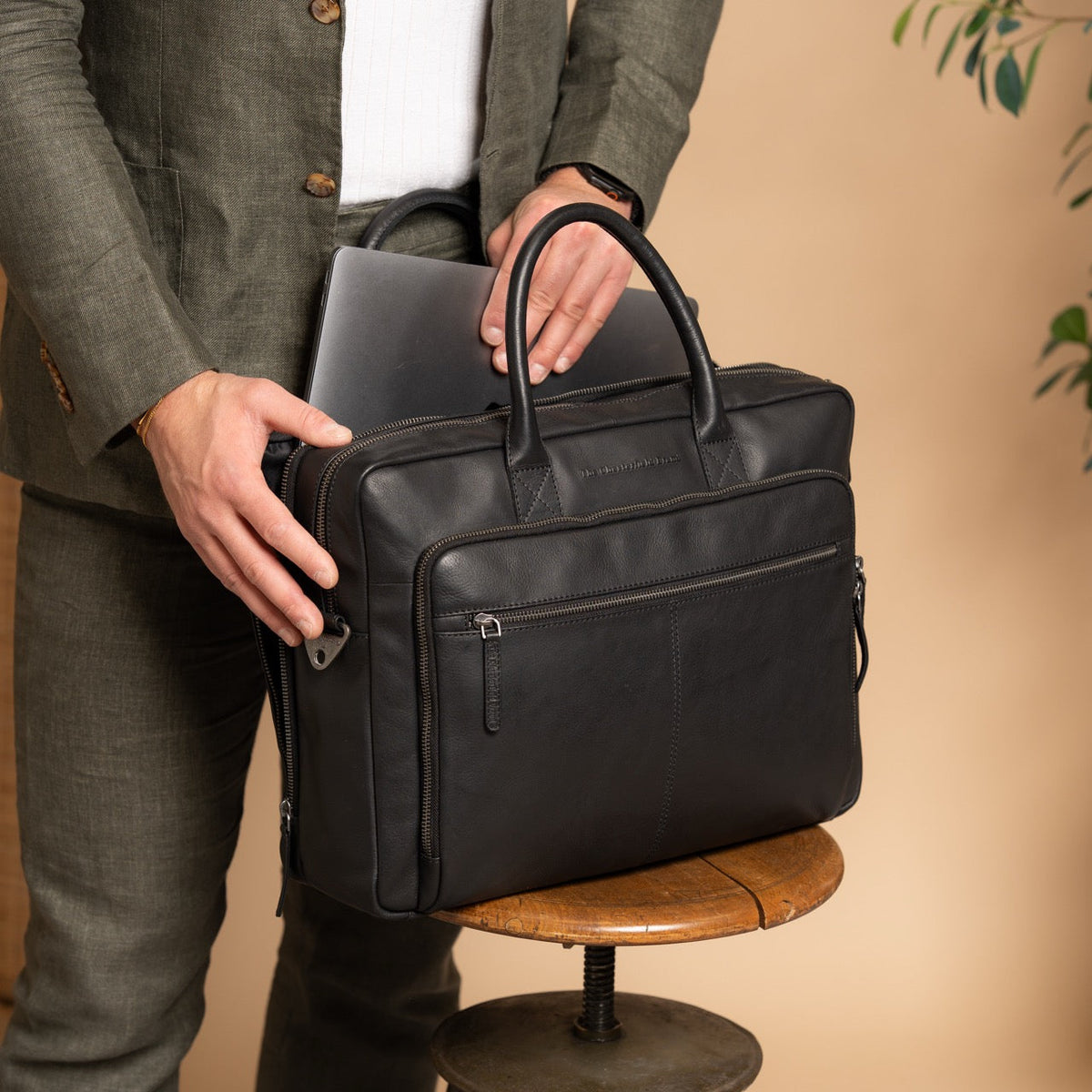 
Tacama Full-Grain Leather Laptop Bag - Structured Side Profile Showing Gusset Depth & Expansion Capacity