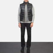 
Men's Reeves Black Leather Puffer Vest - Lateral Side Profile View Showing Sleeve Cut & Athletic Taper Fit