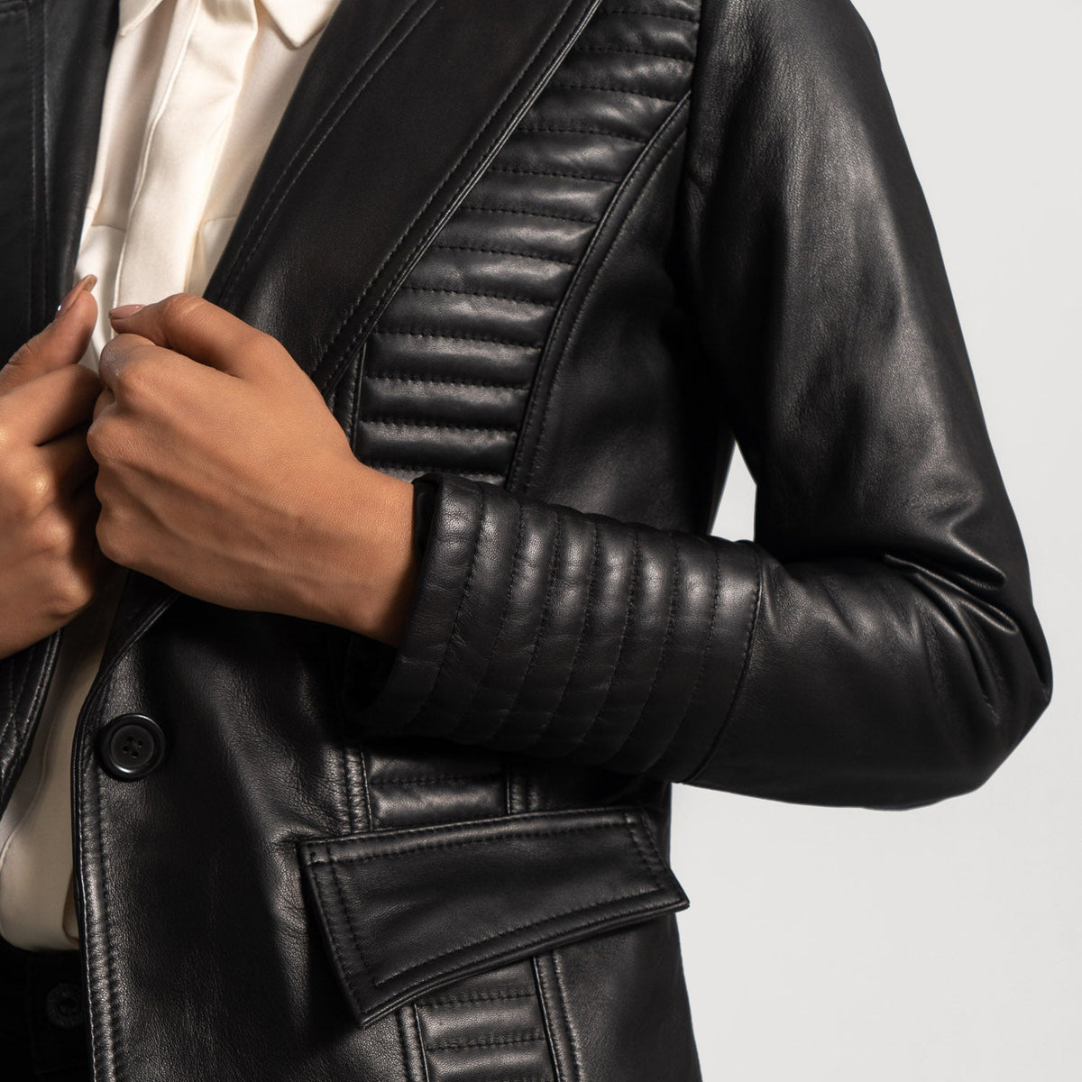 
Women's Selina Black Leather Blazer - Lateral Side Profile View Showing Sleeve Cut & Athletic Taper Fit